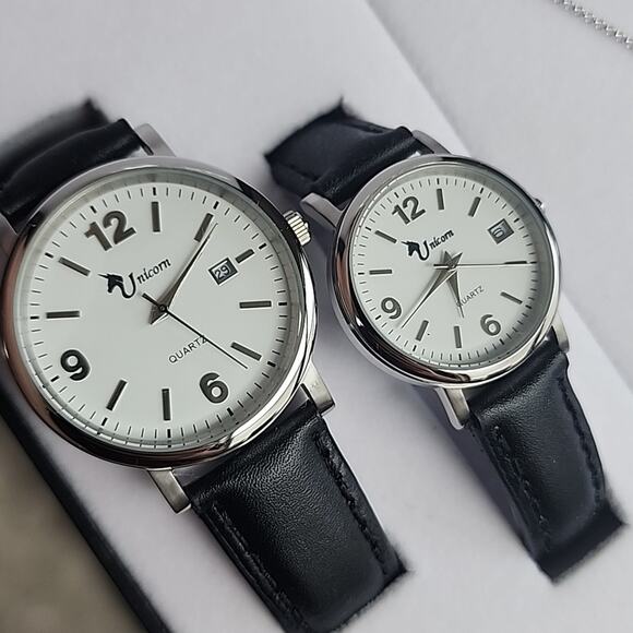 Boutique Jewelry - Two Black Banded Unicorn Quartz Watches